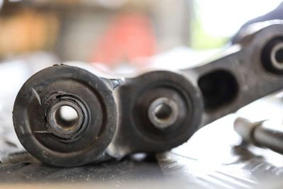 Worn Suspension Bushings – Symptoms, Causes & Replacement Costs